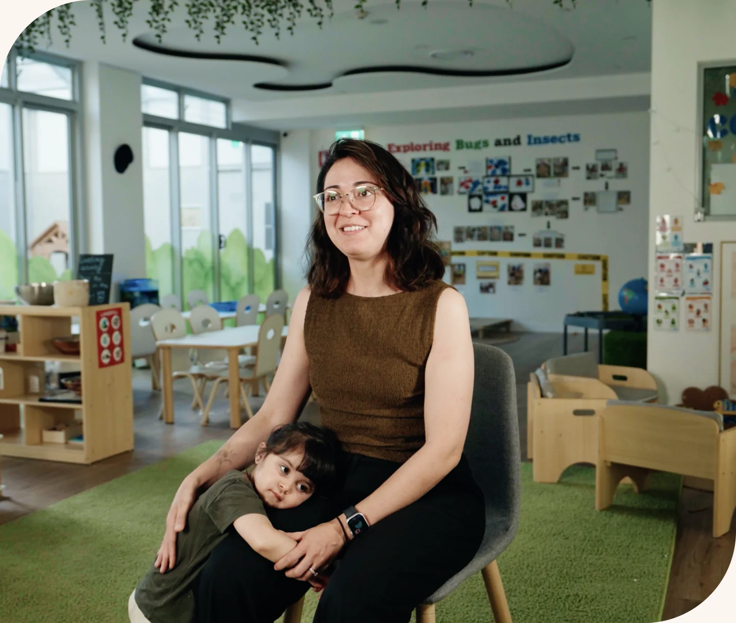 A parent and educator talking together at the centre