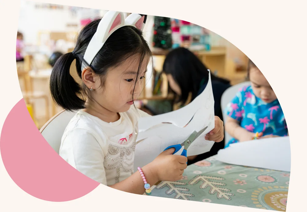 A child engaged in focused learning